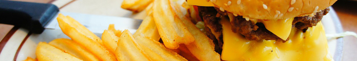 Eating Burger at Rally's restaurant in Charleston, WV.
